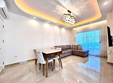 Двухкомнатная квартира с мебелью и бытовой техникой в элитном комплексе, в 400м от моря в Махмутларе ID-8779 фото-3