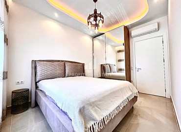Двухкомнатная квартира с мебелью и бытовой техникой в элитном комплексе, в 400м от моря в Махмутларе ID-8779 фото-6