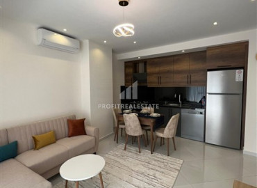 Furnished one-bedroom apartment in a new premium class residence in Mahmutlar ID-8792 фото-1