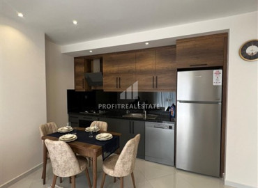 Furnished one-bedroom apartment in a new premium class residence in Mahmutlar ID-8792 фото-2