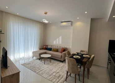 Furnished one-bedroom apartment in a new premium class residence in Mahmutlar ID-8792 фото-4