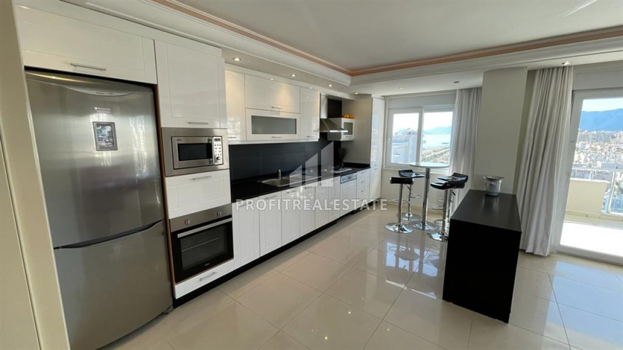Furnished view duplex-penthouse 3 + 2 50 meters from the sea in Mahmutlar ID-8805 фото-2
