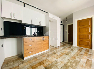 Новая газифицированная двухкомнатная квартира в центре Мерсина, макрорайон Чифтликкёй ID-8892 фото-1