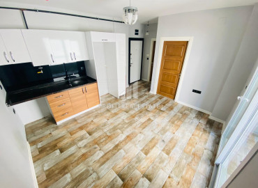 New gasified one-bedroom apartment in the center of Mersin, Ciftlikkoy macrodistrict ID-8892 фото-2