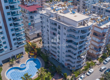 Inexpensive two bedroom apartment, ready to move in, with a separate kitchen, 350 meters from the sea, Mahmutlar, Alanya 110 m2 ID-8893 фото-1