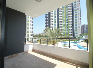 New apartment 2 + 1 in Tej, Mersin, in a gasified residence with good facilities by the sea ID-8896 фото-4