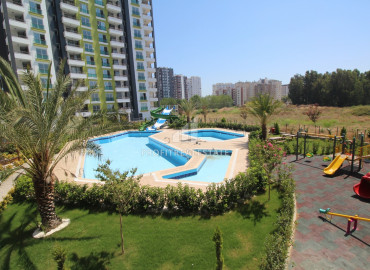 New apartment 2 + 1 in Tej, Mersin, in a gasified residence with good facilities by the sea ID-8896 фото-5