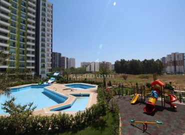 New apartment 2 + 1 in Tej, Mersin, in a gasified residence with good facilities by the sea ID-8896 фото-6