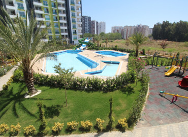 New apartment 2 + 1 in Tej, Mersin, in a gasified residence with good facilities by the sea ID-8896 фото-15