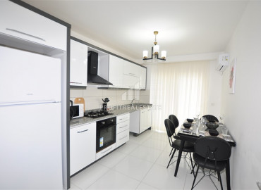 Furnished 2 + 1 apartment with a separate kitchen in a premium residence, 350m from the sea in Mahmutlar ID-8916 фото-3