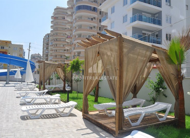Furnished 2 + 1 apartment with a separate kitchen in a premium residence, 350m from the sea in Mahmutlar ID-8916 фото-12