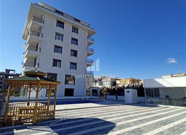 Элегантная дизайнерская квартира 1+1 в резиденции с бассейном, у моря в Каргыджаке ID-8938 фото-18