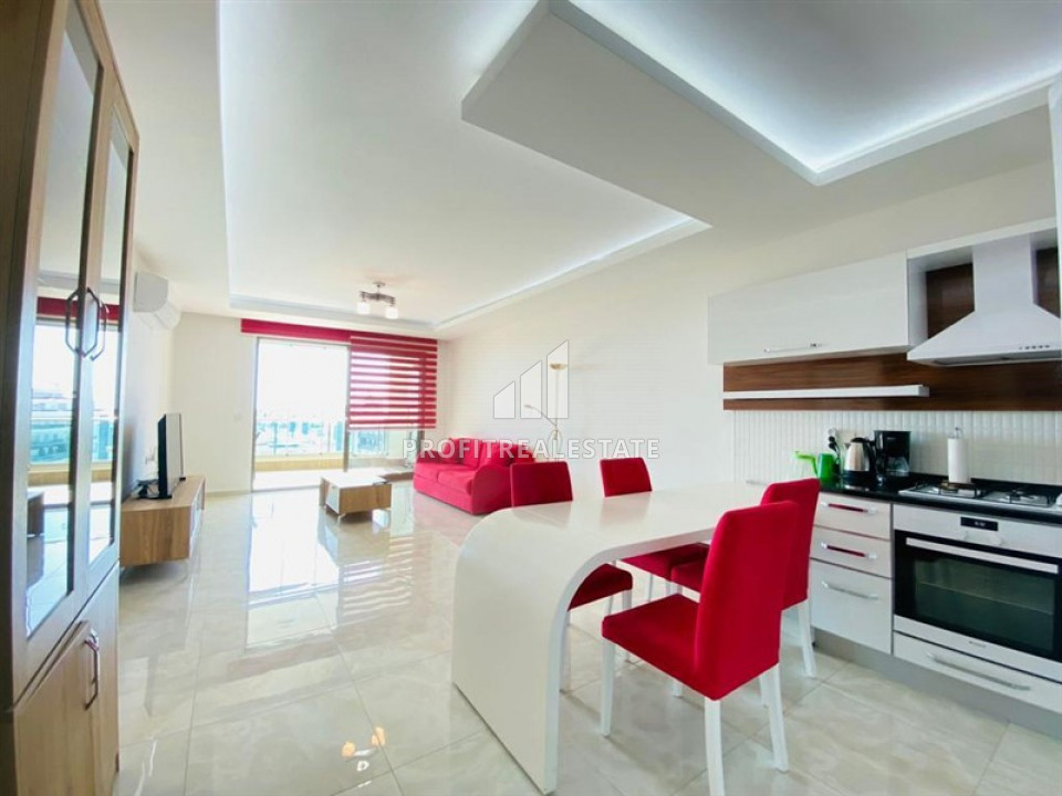 Spacious one-bedroom apartment of 75m² in a luxury residence in Mahmutlar ID-8954 фото-1