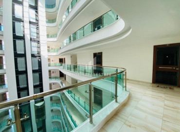 Просторная двухкомнатная квартира, площадью 75м² в элитном комплексе в Махмутларе ID-8954 фото-16