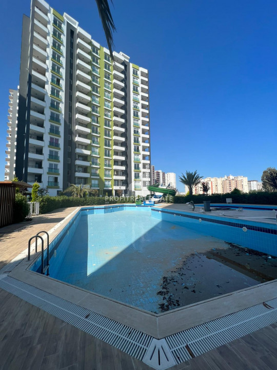 Apartment 2 + 1 and 3 + 1 from the developer in a new residence with good facilities by the sea in Tece, Mersin, ID-8969 фото-1