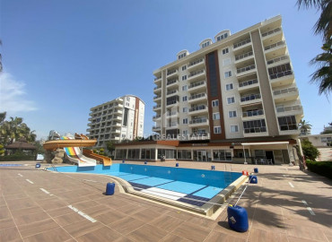One-bedroom apartment, furnished, in a residential residence with a private beach, in Avsallar, Alanya, 58 m2 ID-8979 фото-1