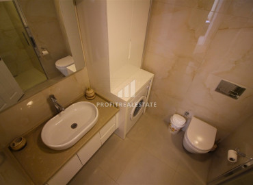 Ready-to-live-in two bedroom apartment in the very center of Mahmutlar, 150m from the sea ID-8981 фото-15