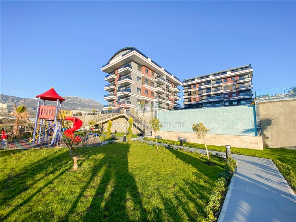 Новая двухкомнатная квартира с выходом в сад в комплексе премиум класса в Каргыджаке. 700м от моря ID-8982 фото-1