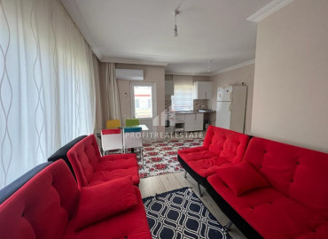 Inexpensive apartment 2 + 1 in an urban-type building near the Tuesday market in Mahmutlar ID-8992 фото-3