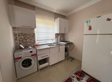 Inexpensive apartment 2 + 1 in an urban-type building near the Tuesday market in Mahmutlar ID-8992 фото-4