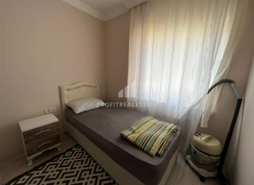 Inexpensive apartment 2 + 1 in an urban-type building near the Tuesday market in Mahmutlar ID-8992 фото-7