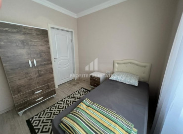 Inexpensive apartment 2 + 1 in an urban-type building near the Tuesday market in Mahmutlar ID-8992 фото-8