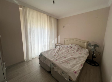 Inexpensive apartment 2 + 1 in an urban-type building near the Tuesday market in Mahmutlar ID-8992 фото-9