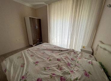 Inexpensive apartment 2 + 1 in an urban-type building near the Tuesday market in Mahmutlar ID-8992 фото-10