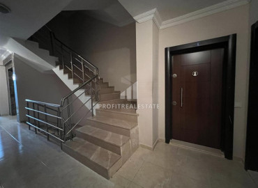 Inexpensive apartment 2 + 1 in an urban-type building near the Tuesday market in Mahmutlar ID-8992 фото-14