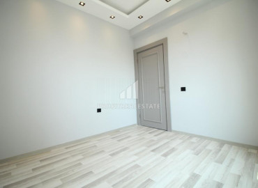 Новая дизайнерская квартира 2+1 в резиденции с минимальной инфраструктурой в Енишехир, Мерсин ID-9014 фото-15