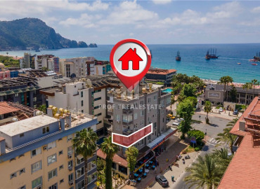 Two bedroom apartment overlooking the Cleopatra beach in an urban-type house, in the very center of Alanya ID-9027 фото-1