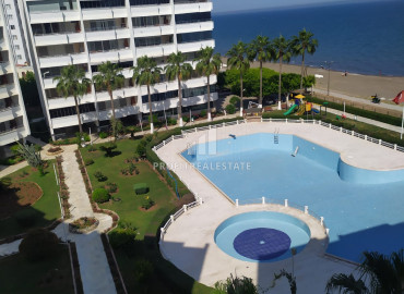 Furnished apartment 2 + 1 in a residence with a swimming pool on the first coastline in Tej, Mersin ID-9030 фото-1