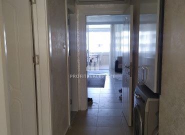 Furnished apartment 2 + 1 in a residence with a swimming pool on the first coastline in Tej, Mersin ID-9030 фото-14