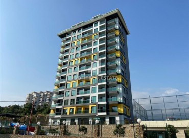 Трехкомнатная квартира с видом на горы, укомплектованная бытовой техникой, в резиденции 2021 года постройки, Махмутлар, Аланья ID-9043 фото-1