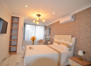 Elegant designer two-bedroom apartment in an urban-type building in the very center of Alanya ID-9061 фото-17