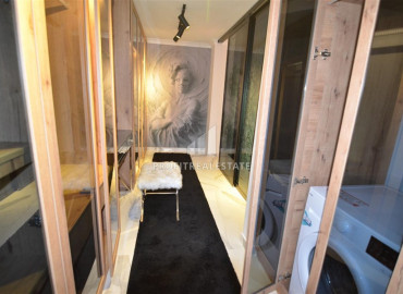 Элегантная дизайнерская квартира с двумя спальнями в доме городского типа в самом центре Алании ID-9061 фото-32