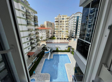 Apartment 1 + 1 with furniture and household appliances in a building with a rich facilities in Mahmutlar ID-9072 фото-12