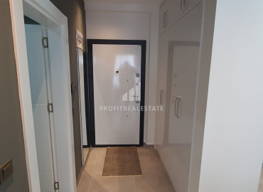 New furnished 1 + 1 apartment with an area of 65m² in a residence with hotel facilities in Mahmutlar ID-8050 фото-17