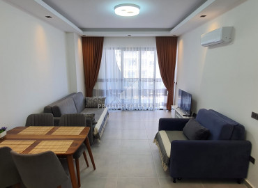 New furnished 1 + 1 apartment with an area of 65m² in a residence with hotel facilities in Mahmutlar ID-8050 фото-26
