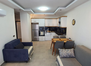 New furnished 1 + 1 apartment with an area of 65m² in a residence with hotel facilities in Mahmutlar ID-8050 фото-29