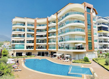 View duplex penthouse 5 + 2 without furniture and household appliances 50 meters from the sea in Kestel ID-9094 фото-1