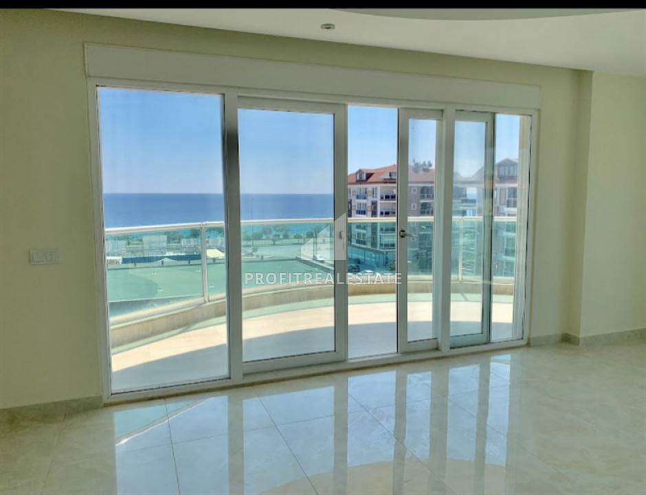 View duplex penthouse 5 + 2 without furniture and household appliances 50 meters from the sea in Kestel ID-9094 фото-2