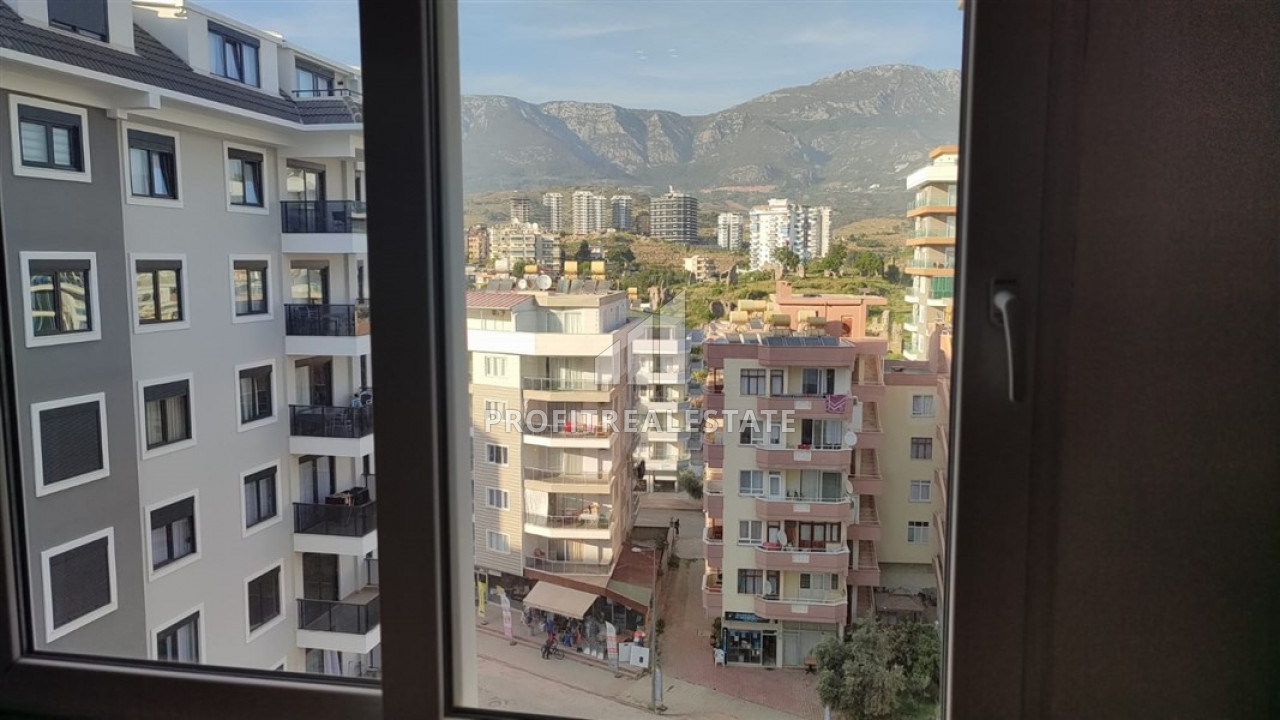 Furnished 2+1 apartment with two bedrooms on the main street of Mahmutlar, 150m from the sea ID-9157 фото-2