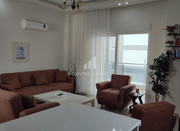 Furnished 2+1 apartment with two bedrooms on the main street of Mahmutlar, 150m from the sea ID-9157 фото-4