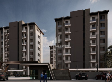 Двух- и трехкомнатные квартиры в строящемся комплексе с хорошей инфраструктурой в Алтынташ, Анталия ID-9198 фото-3