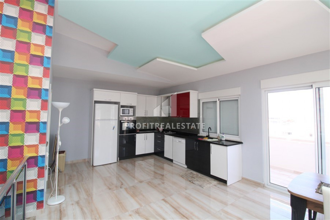 Spacious duplex 3 + 1 in a residence with a swimming pool on the main street of Mahmutlar ID-9231 фото-2
