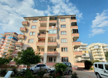 Three bedroom apartment with a separate kitchen on the first coastline in Mahmutlar ID-9249 фото-1}}
