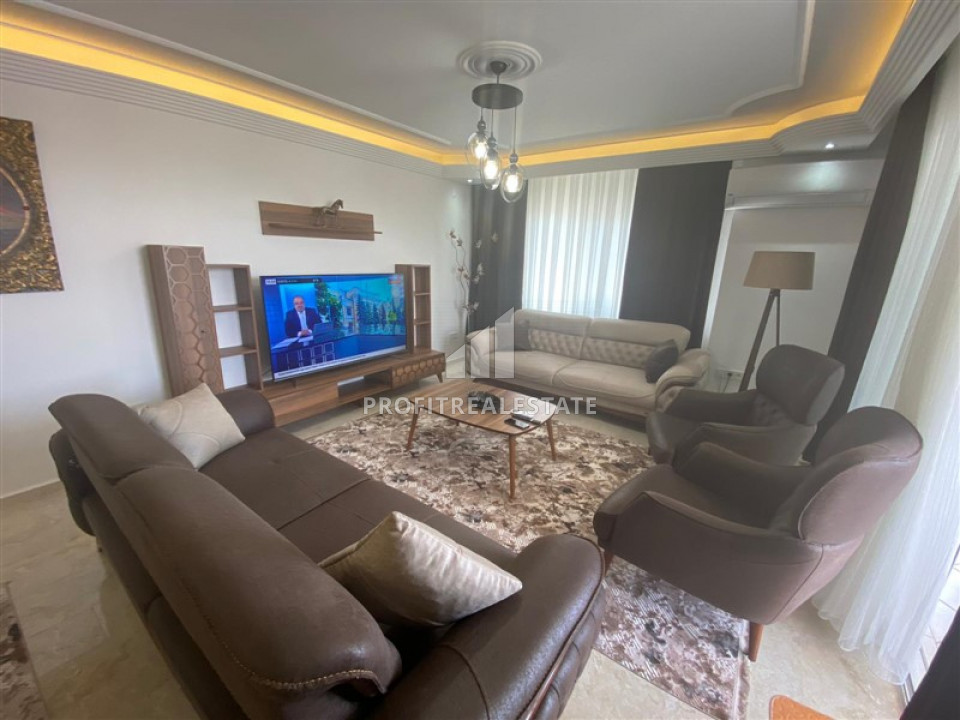 View furnished duplex 4 + 1 with a private sauna in a residence with facilities in Mahmutlar ID-9252 фото-1