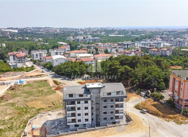 Inexpensive three bedroom apartment in a new residence with a swimming pool, Oba, Alanya, 155 m2 ID-9258 фото-3