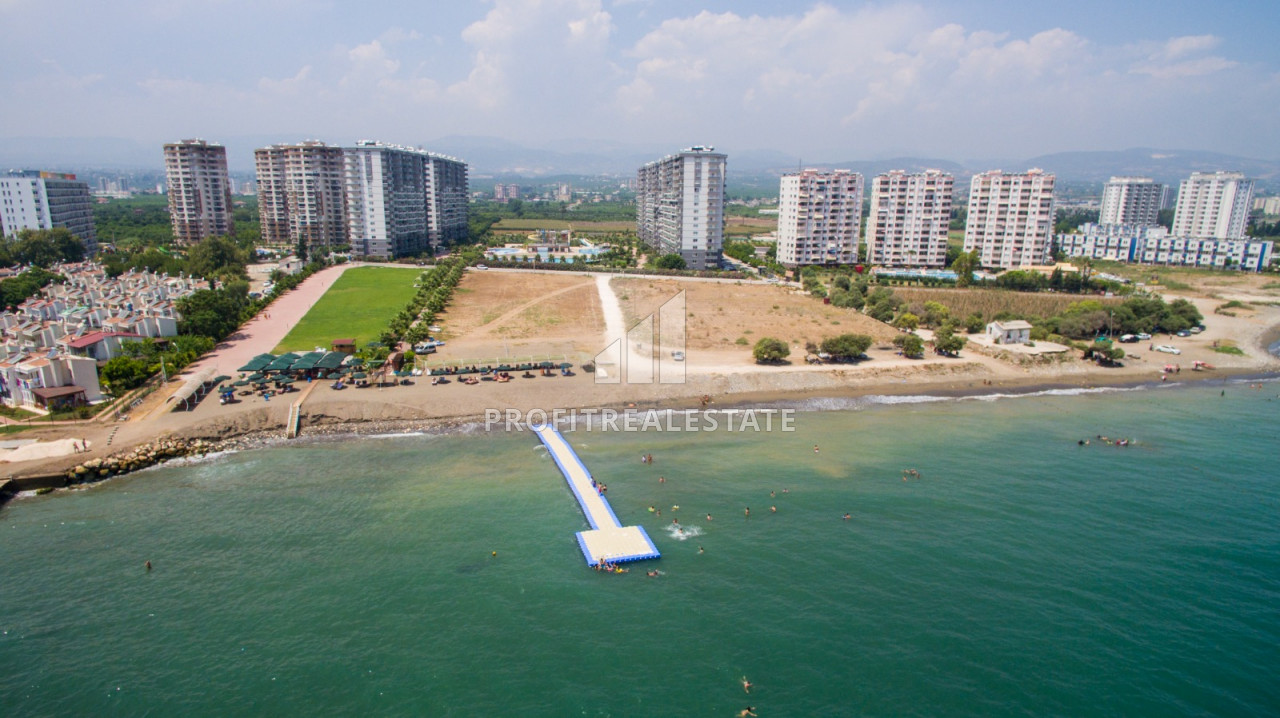 Apartment with two and three bedrooms on different floors in a luxury residence in Cesmeli, Mersin ID-9282 фото-2